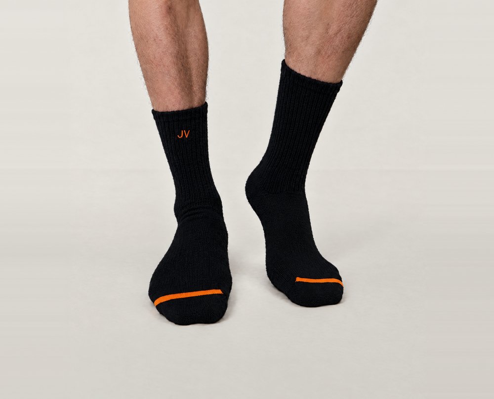 KINJO 01 black pair worn, with the initials JV stitched on one sock